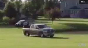 Three police cars and a helicopter chased this pickup truck across Village Green GC Tuesday. Image via CNN.
