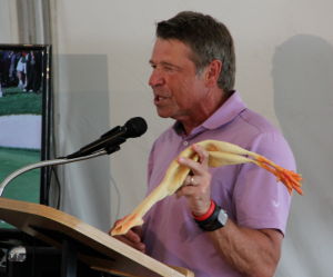 Novak shows one of the rubber chickens he'd give away when he was president of KFC.