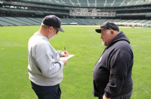 Bob Christofferson (left), head groundskeeper at Safeco Field, with Leo Liebert, assistant groundskeeper. Photo by Seth Jones