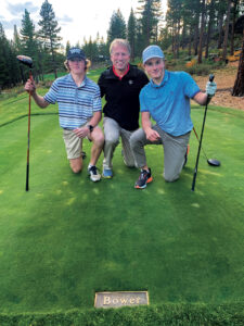 The Bower family, including Scott (center), Zac and Ben will forever be a part of Martis Camp thanks to this plaque on the 16th tee. (Photo: Scott Bower)