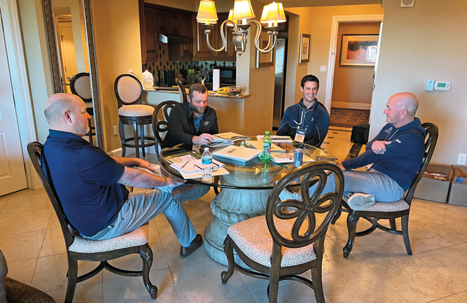 Paul Blodorn (left) and Jeff Rampino (right) of Quali-Pro meet with Brian Dearstine, The Preserve at Eisenhower and James Bryson, Bedens Brook Club. (Photo: Golfdom staff)