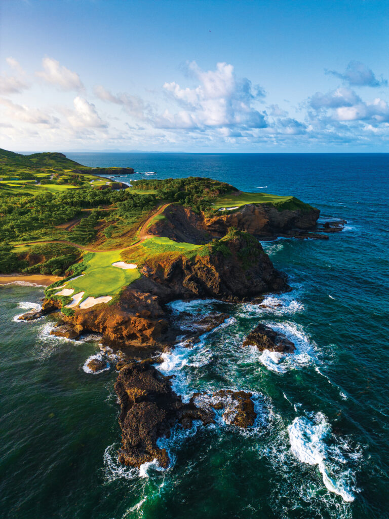 The 16th hole at Point Hardy GC, a course that provides stunning views and unique challenges for turf students and golfers alike. (Photo:  Michael Marcellin, courtesy of Cabot)