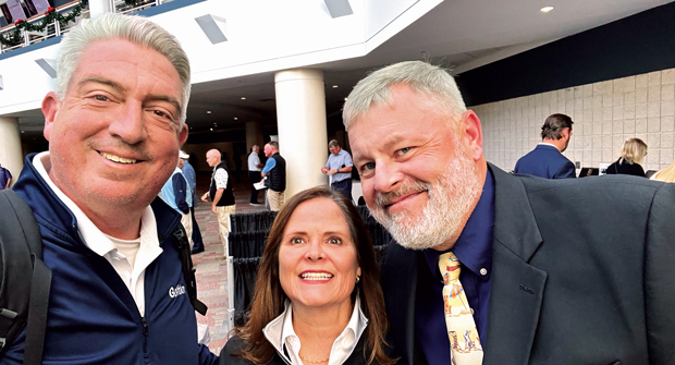 100 years of Smith Turf and Irrigation: Another member of the 100-year club is Smith Turf and Irrigation, who celebrated the landmark in 2025. Jones, Anna-Lindsay Yarbrough, president of Smith Turf and Irrigation, and Tim Kreger, executive director, Carolinas GCSA, celebrate with a selfie. (Photo: Golfdom staff)